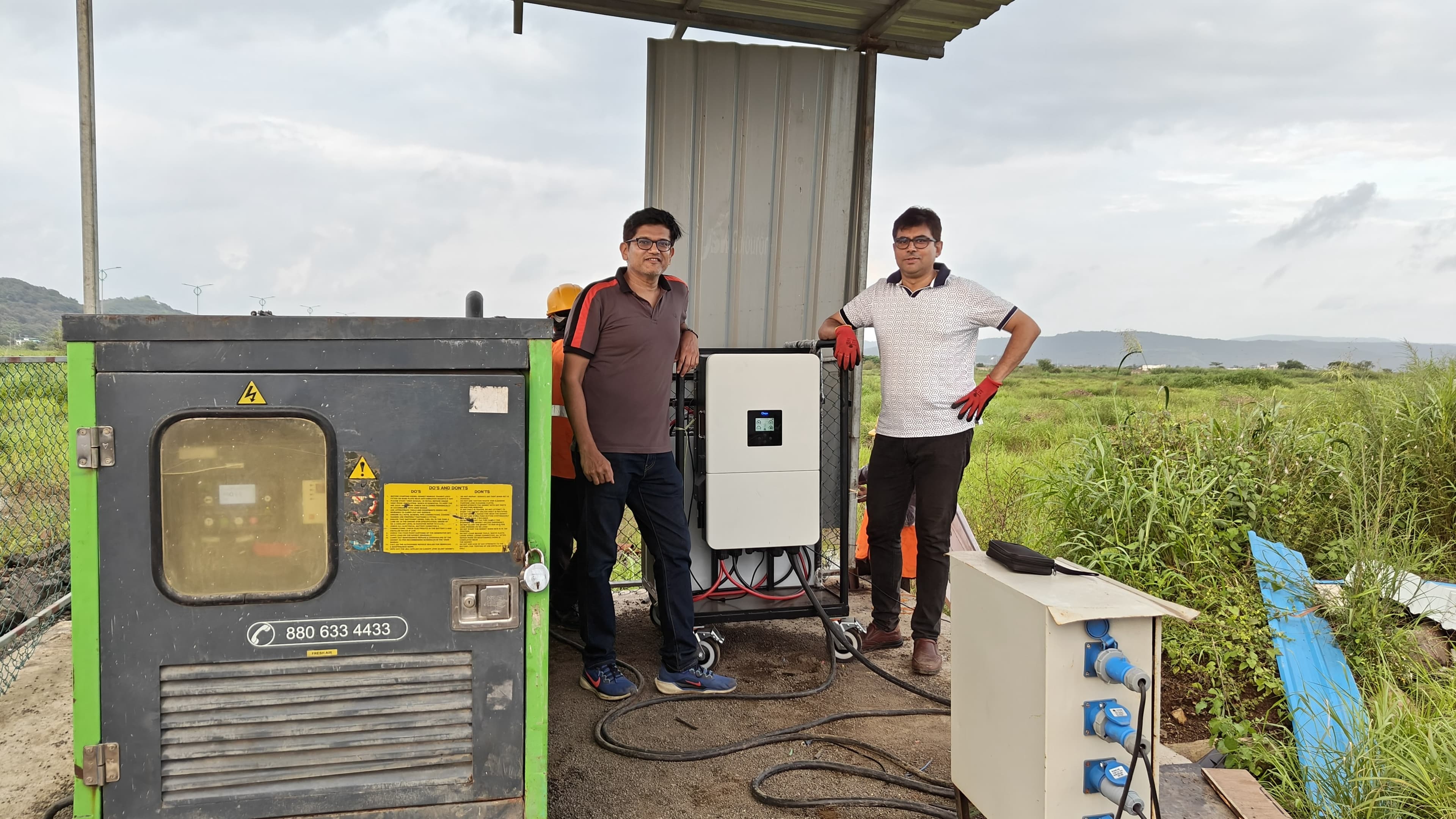 SmartBatt co-founders at the JNPA site — SmartBatt unit installed alongside the 30 KVA diesel generator