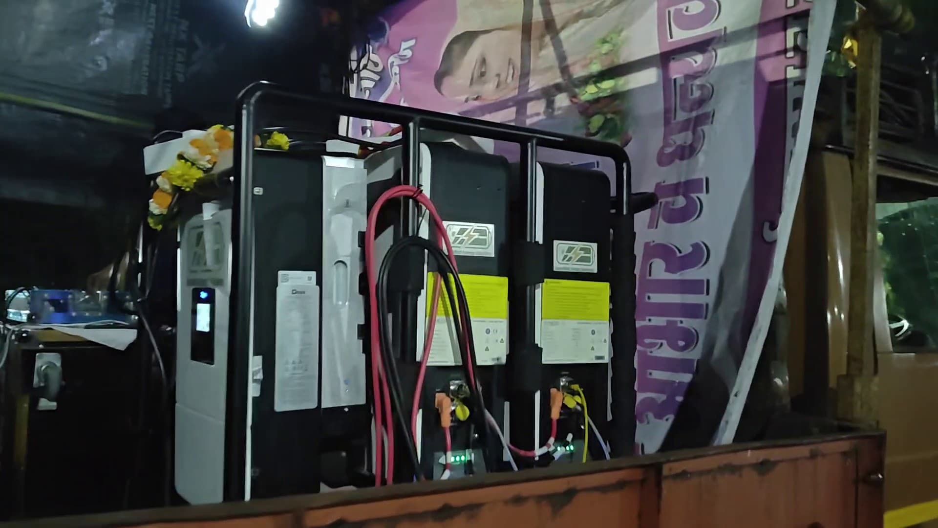 Marigold flowers placed on the SmartBatt unit by the festival association