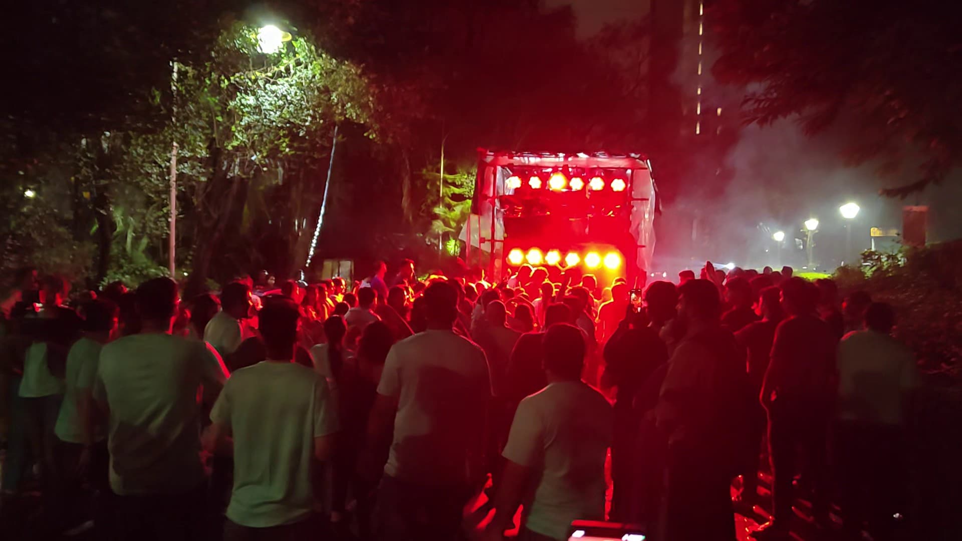 200-300 devotees dancing alongside — no fumes, clean air throughout the 15 km route